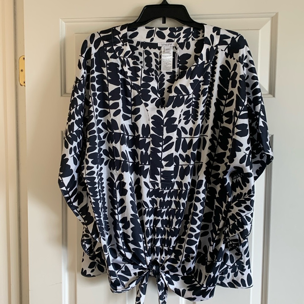 Brand new Chicos front tie blouse. Never worn!